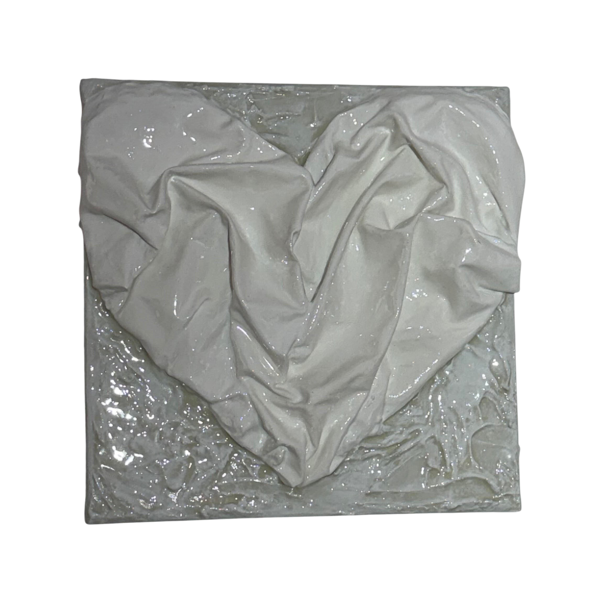Bianco Terra AFFETTO No. 04 textile heart wall art with draped fabric, plaster, and glossy resin in alabaster white.