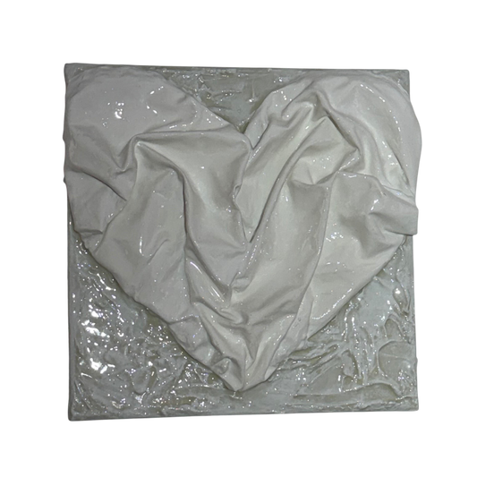 Bianco Terra AFFETTO No. 04 textile heart wall art with draped fabric, plaster, and glossy resin in alabaster white.