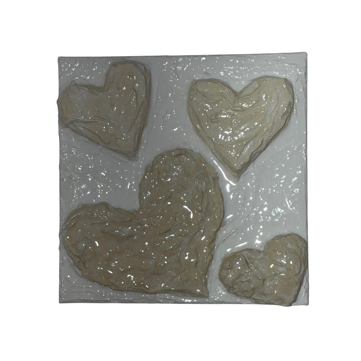 Bianco Terra CUORE No. 01 square wall art featuring three 3D sculpted plaster hearts in alabaster and nude tones.