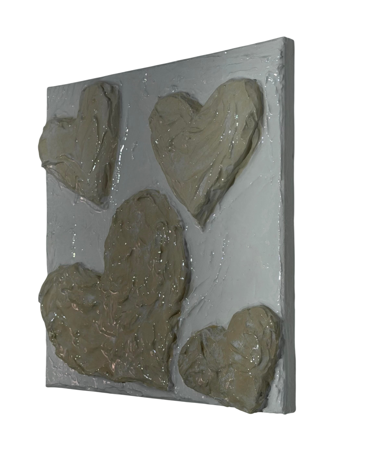 Bianco Terra CUORE No. 01 3D heart wall art with textured buttercream plaster in alabaster and chalk white tones.
