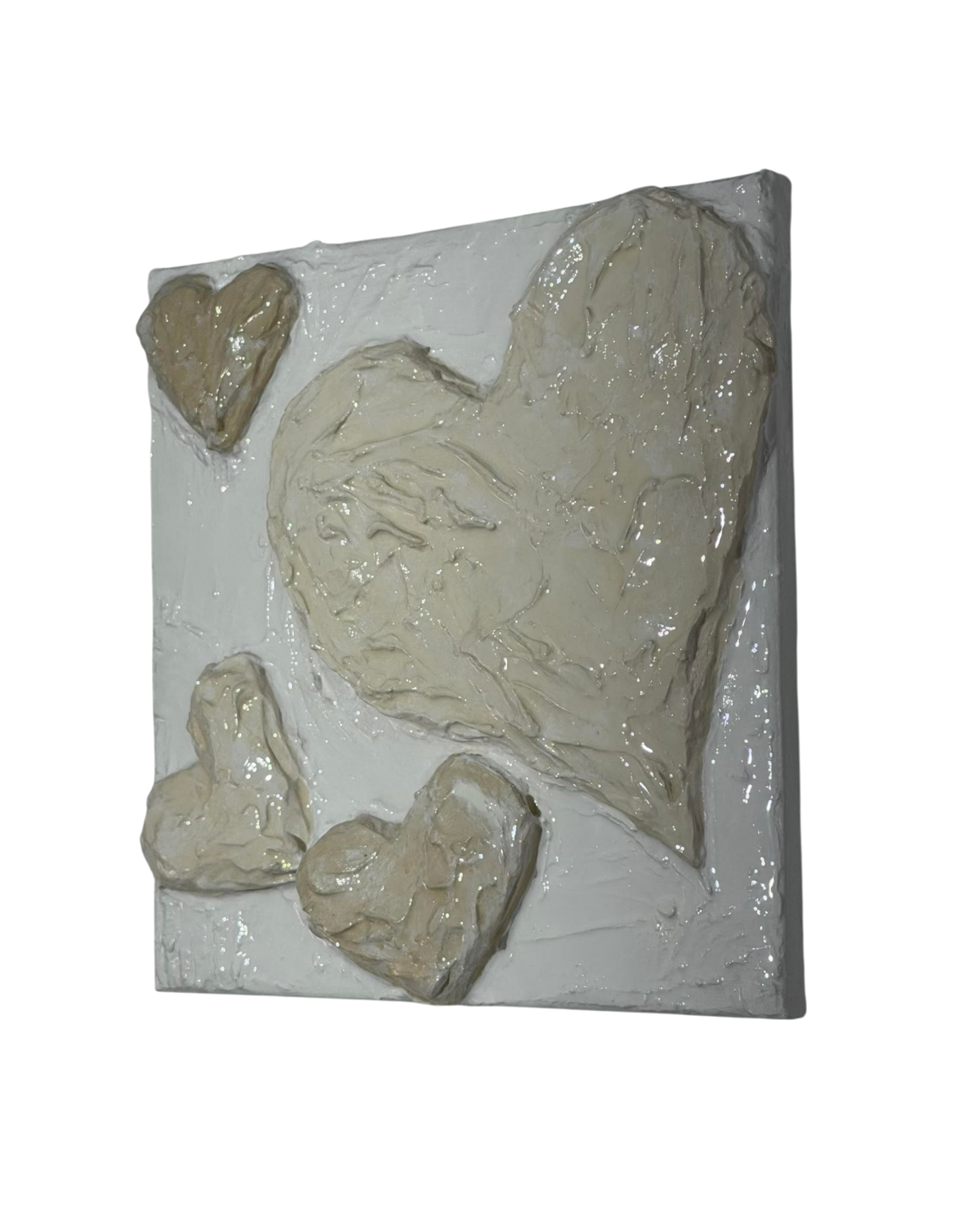 Bianco Terra CUORE No. 02 square wall art featuring hand-sculpted 3D plaster hearts in alabaster and chalk white tones.