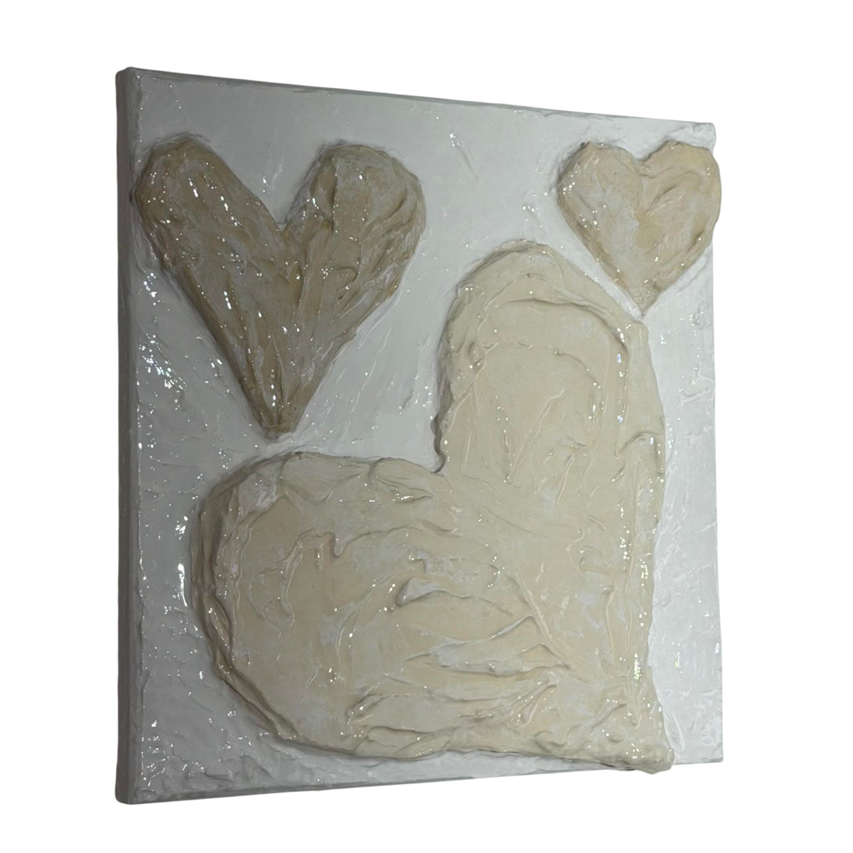 Bianco Terra CUORE No. 03 textured plaster heart wall art in alabaster and chalk white with glossy resin finish.