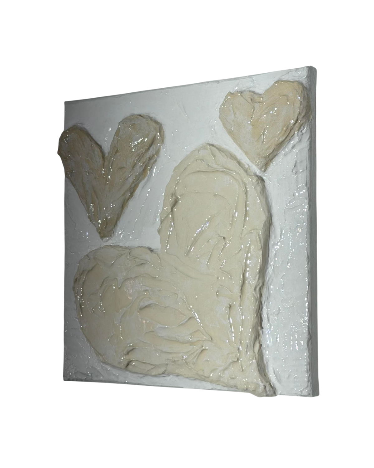 Bianco Terra CUORE No. 03 3D heart wall art with heavy buttercream plaster texture in shades of chalk and alabaster.