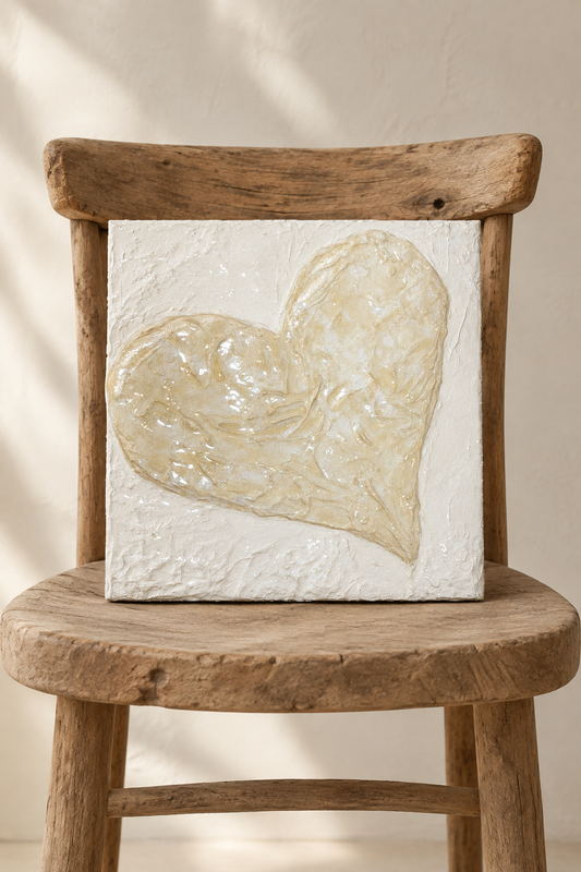 Bianco Terra CUORE No. 04 hand-sculpted 3D heart wall art with high-gloss resin finish on a textured plaster canvas.