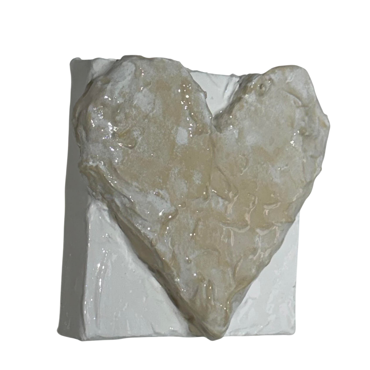 Bianco Terra Cuore Mini No. 01 miniature 3D heart sculpture in alabaster and chalk plaster with a glossy resin finish.
