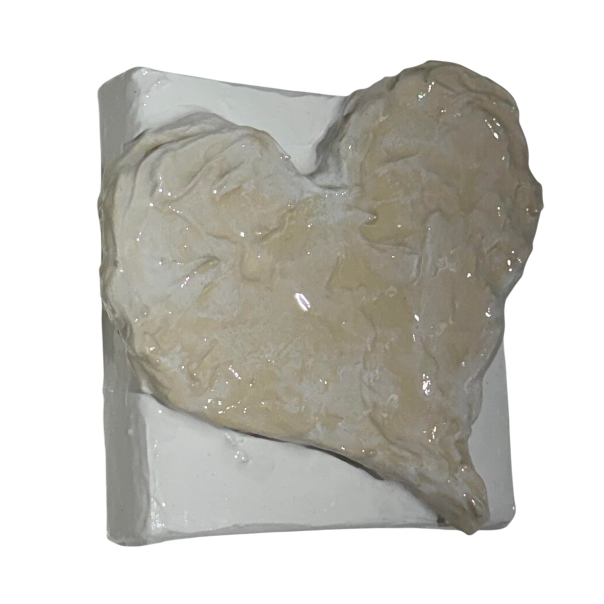 Bianco Terra CUORE MINI NO. 02 miniature heart sculpture with textured buttercream plaster and glossy resin finish.