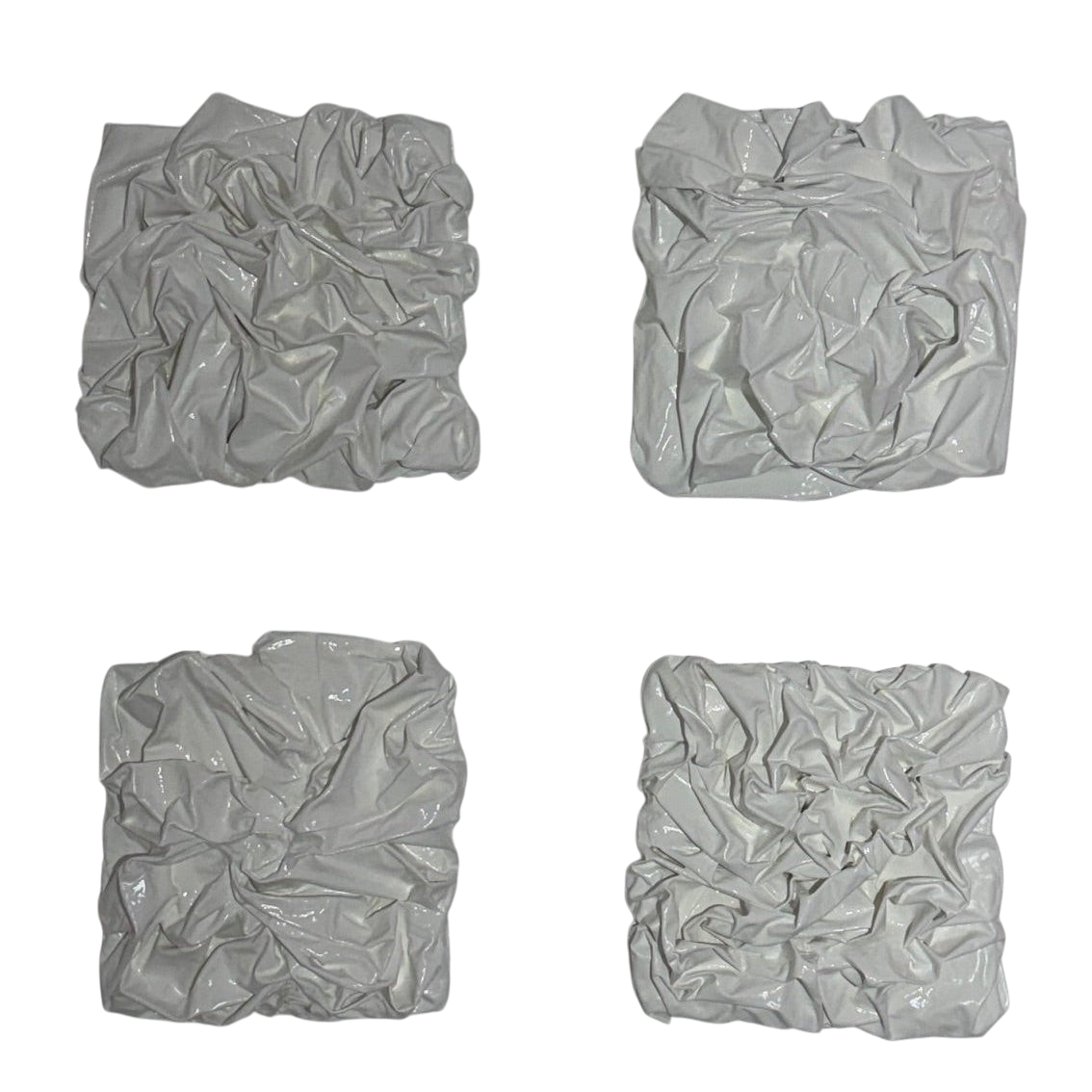 Bianco Terra PANNO No. 01 square wall art featuring four hand-sculpted white corrugated textile relief panels.